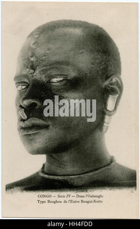 Congo, Africa - Terrifying Warrior with bullet piercings Stock Photo