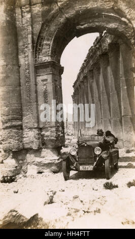 European Gentleman driven Triumphal Arch, Palmyra, Syria Stock Photo
