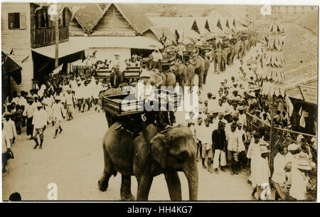 Procession of dignitaries riding on elephants - Singapore Stock Photo