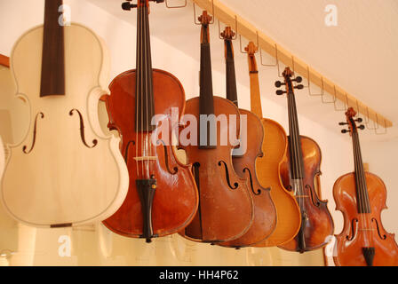 Violins in luthiers workshop Stock Photo
