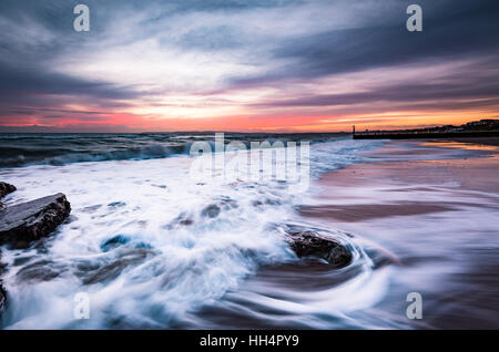 Long exposure capture of Bournemouth Beach at sunset Stock Photo