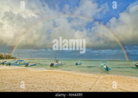 Rainbow over Playa Del Carmen Mexico Beach, this was taken near the Blue Parrot resort Stock Photo