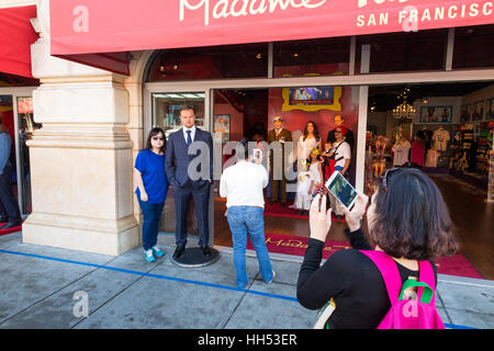 People taking photographs of their firends / family members at the front of the Madame Tussauds wax museum Stock Photo