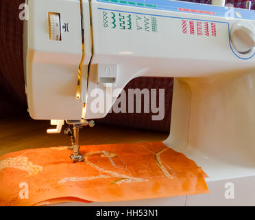 Closeup of sewing machine stitching cloth Stock Photo