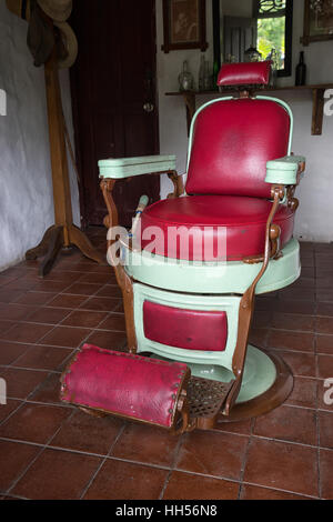 vintage barber chair in an antique shop Stock Photo