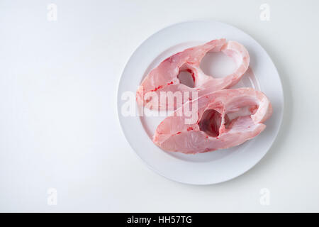 slice pomegranate fish on a disc Stock Photo
