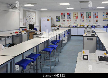 Science classroom in a new UK secondary school. Shows laboratory benches, stools and science equipment. Empty, no pupils. Stock Photo