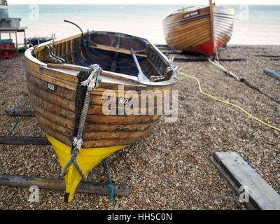 Clinker Fishing Boat hauled up on the shingle, Deal Beach, Kent UK Stock Photo