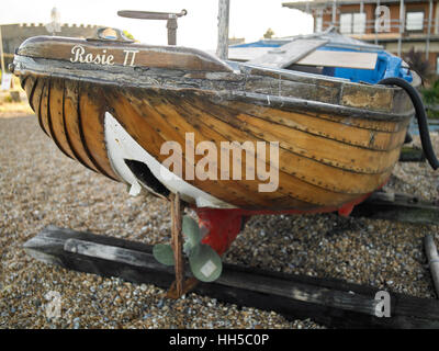 Clinker Fishing Boat hauled up on the shingle, Deal Beach, Kent UK Stock Photo