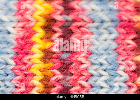 Closeup of a knitted woolen multicolored background Stock Photo