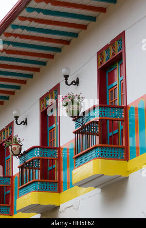 Colorful roof and balconies with potted flowers El Jardin Colombia Stock Photo