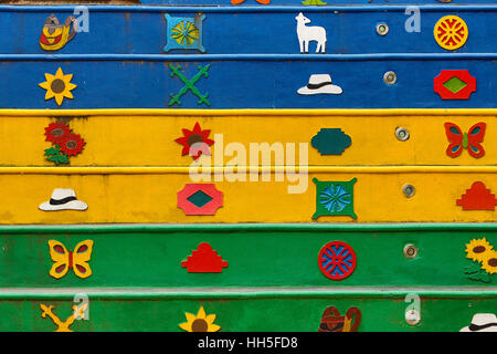Brightly colored zocalos with natural and geoometrical designs, Guatape Colombia Stock Photo