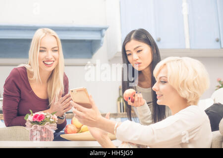 Friends girls having party at home Stock Photo