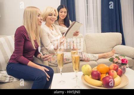 Friends girls having party at home Stock Photo