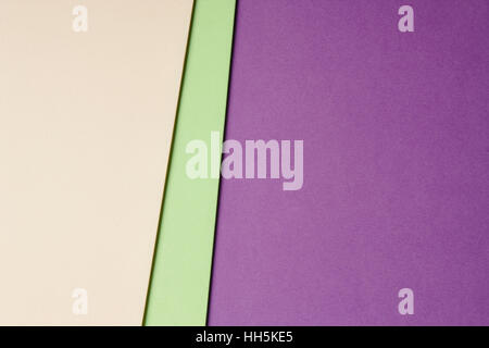 Colored cardboards background beige green purple tone. Copy space. Horizontal Stock Photo