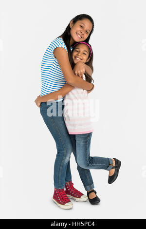 Two Asian Girl Sisters Hugging Togetherness Concept Stock Photo