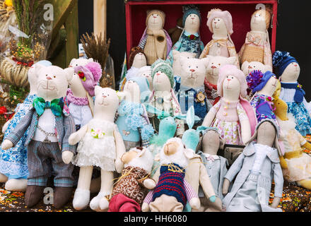 Creative handmade stuffed toys for sale at the market Stock Photo