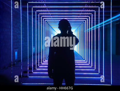 EDITORIAL USE ONLY On Your Wavelength by Marcus Lyall uses mind-power to choreograph light patterns at the Canary Wharf Winter Lights Festival 2017, London, which launches today. Stock Photo