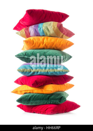 Pile of colorful pillows over white background Stock Photo