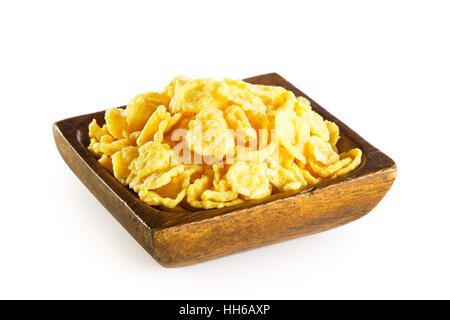 Cornflakes in wooden bowl isolated on white background Stock Photo