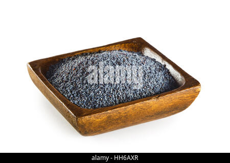 Blue poppy seeds in wooden bowl isolated on white background Stock Photo