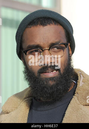 Black Lives Matter protester Joshua Virasami, 26, returns to Willesden Magistrates Court, London, following lunch, to face a charge of wilfully obstructing the highway in August last year after he helped to block the M4 Spur Road to Heathrow Airport. PRESS ASSOCIATION Photo. Picture date: Tuesday January 17, 2017. See PA story COURTS Heathrow. Photo credit should read: Nick Ansell/PA Wire Stock Photo