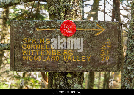 An aged trail sign on the back side of Slide Mountain on the Slide-Cornell-Wittenburg Trail in the Catskills Mountains of New York. Stock Photo