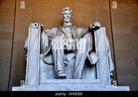 Washington, DC - April 10, 2014:  Daniel Chester French's sculpture of a seated President Abraham Lincoln inside the Lincoln Memorial Stock Photo