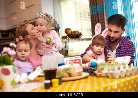 Parents and three girls before the Easter Stock Photo