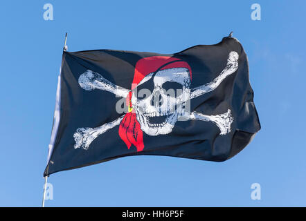 Pirate flag on boat by River Thames towpath, Old Windsor, Berkshire, England, United Kingdom Stock Photo