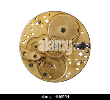 Old and dismantled clockwork mechanism isolated on white background Stock Photo
