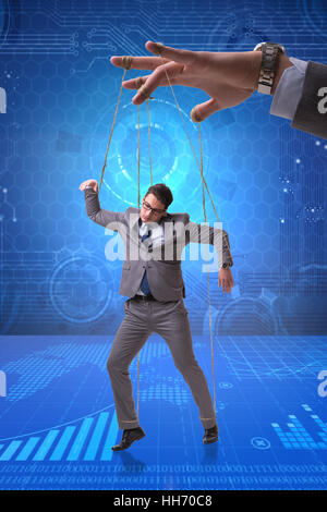 Businessman puppet being manipulated by boss Stock Photo