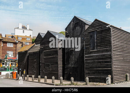 Historical Net-Shops in Hastings. These wooden constructions, weather boarded and tarred and used for storage Stock Photo