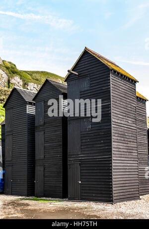 Historical Net-Shops in Hastings. These wooden constructions, weather boarded and tarred and used for storage Stock Photo