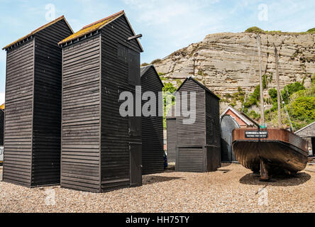 Historical Net-Shops in Hastings. These wooden constructions, weather boarded and tarred and used for storage Stock Photo