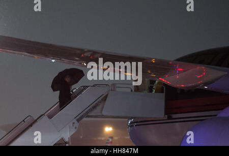 Washington, USA. 17th January, 2017. US President-elect Donald Trump, boards his plane at Laguardia airport on January 17, 2017 in New York City. U.S. President Elect Donald Trump is still holding meetings upstairs at Trump Tower just 3 days before the inauguration. Credit: Bryan R. Smith/Pool via CNP/MediaPunch Credit: MediaPunch Inc/Alamy Live News Stock Photo