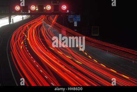 Hanover, Germany. 17th Jan, 2017. The photograph taken with a long exposure time shows light trails from vehicles on the Autobahn A2 motorway in the region of Hanover, Germany, 17 January 2017. Photo: Julian Stratenschulte/dpa/Alamy Live News
