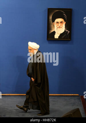 Theran, Iran. 17th Jan, 2017. Iranian President Hassan Rouhani arrives at a press conference in Tehran, Iran, on Jan. 17, 2017. Rouhani said Iran will not accept a review of its international nuclear deal, reported local media on Wednesday. The international nuclear deal, known as the Joint Comprehensive Plan of Action (JCPOA), resolved Tehran's decade-long controversial nuclear issue. Credit: Ahmad Halabisaz/Xinhua/Alamy Live News Stock Photo