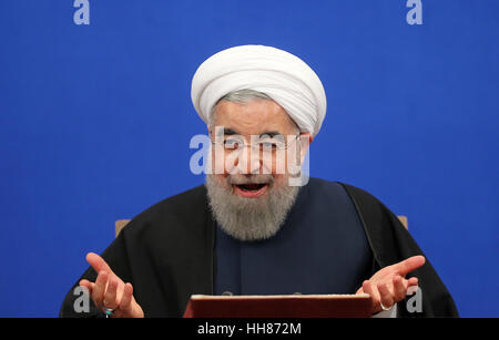 Theran, Iran. 17th Jan, 2017. Iranian President Hassan Rouhani speaks during a press conference in Tehran, Iran, on Jan. 17, 2017. Rouhani said Iran will not accept a review of its international nuclear deal, reported local media on Wednesday. The international nuclear deal, known as the Joint Comprehensive Plan of Action (JCPOA), resolved Tehran's decade-long controversial nuclear issue. Credit: Ahmad Halabisaz/Xinhua/Alamy Live News Stock Photo