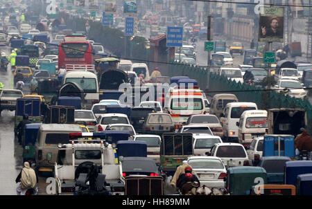 Huge numbers of motors stuck in traffic jam during rain at GT Road in Peshawar on Wednesday, January 18, 2017. Stock Photo