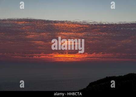 Beautiful sunrise over the North Sea as seen from Bempton cliffs on the east coast of England. Stock Photo