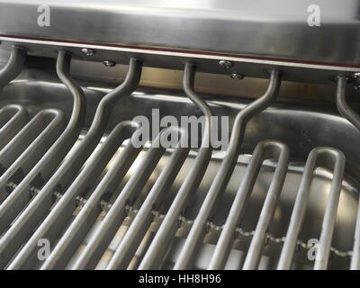 Industrial kitchen appliances for industrial kitchens; fryer detail, electric heater element Stock Photo