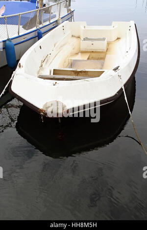 Small fishing boats in a harbor. Stock Photo