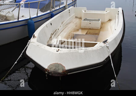 Small fishing boats in a harbor. Stock Photo