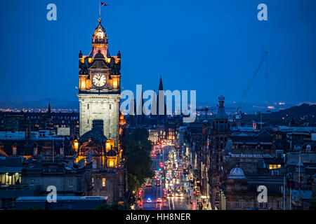 Balmoral Hotel Clock Tower and rain soaked Princes Street, Edinburgh, Scotland, United Kingdom Stock Photo