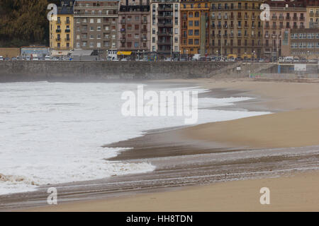 Shore covered by waves in a strong swell day in Donostia (Guipuzcoa, Basque country, Spain). Stock Photo