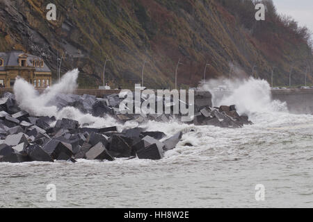 Waves breaking in breakwater at the shore in Donostia (Guipuzcoa, Basque country, Spain). Stock Photo