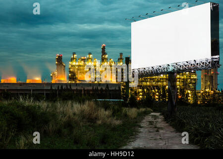 Double exposure of black billboard and electric generating factory at twilight time can advertisement for display or montage Stock Photo
