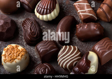 Assortment of fine chocolate candies, white, dark, and milk chocolate Stock Photo