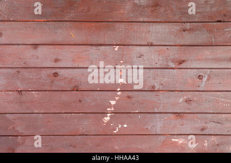 7 horizontal red worn painted wooden boards or planks rustic rural background Stock Photo